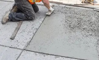 Professional repairing a concrete floor in Charleston, SC