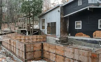 Prepared site with foundation forms for home remodeling and addition project in Charleston, SC